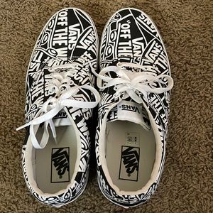 Vans lace up black and white shoes